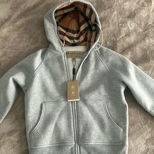 Burberry zip up hoodie in size xs with tags